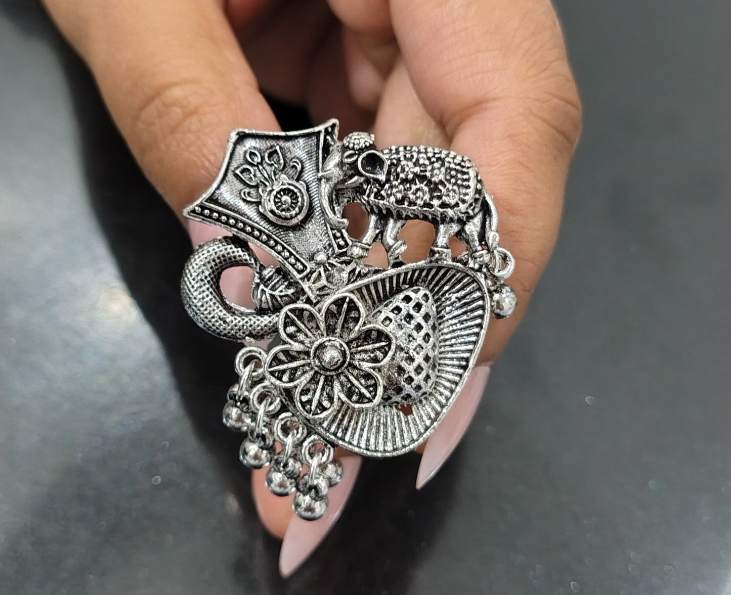 oxidized ring for any ethnic party look.